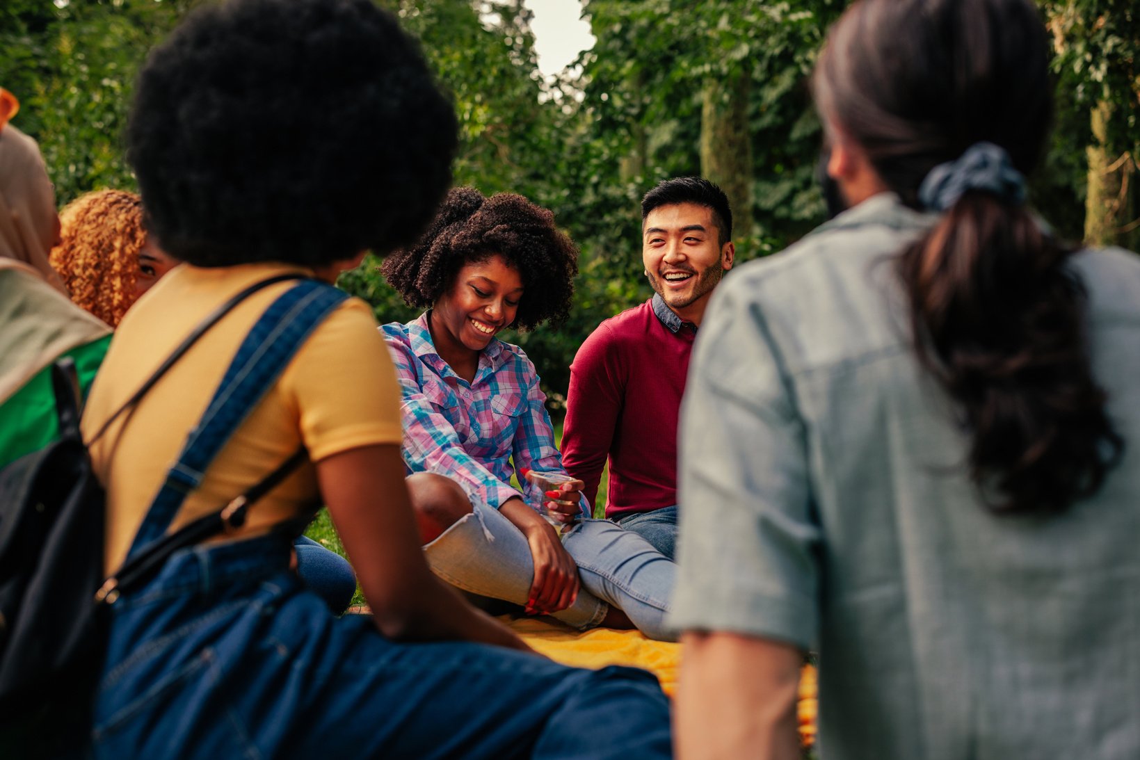 Friends gathering in community park